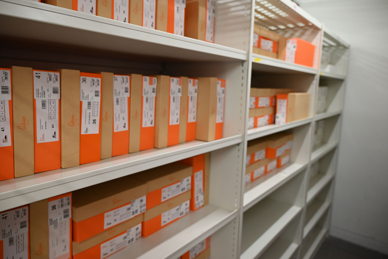 Retail stockroom shelving storing boxed toys and games, an example of shop stockroom shelving